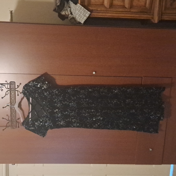 Long black and sparkles holiday dress with crisscross cut out in back. - Picture 2 of 4